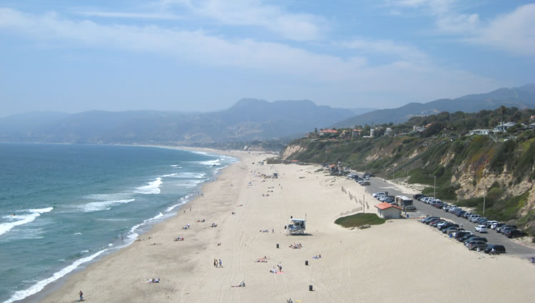 ZUMA BEACH, CALIFORNIA, USA - People on Zuma beach, public beach