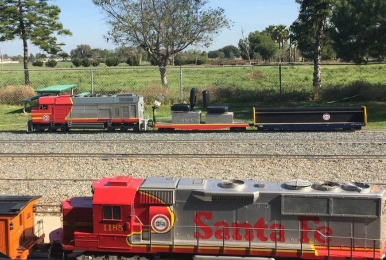 miniature trains waiting for passengers 