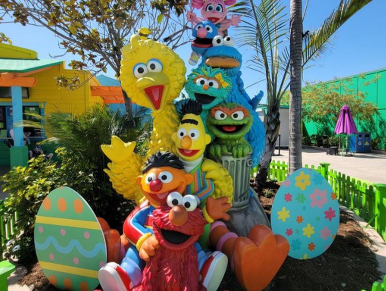 Sesame Street characters, including Elmo, Grover, and Cookie Monster